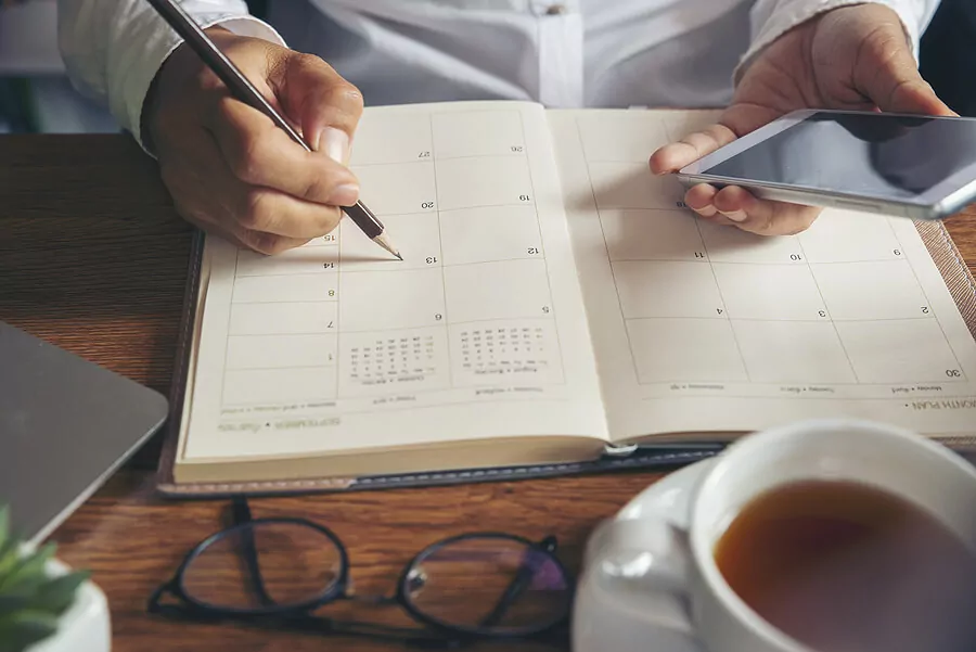 businessman checking calendar